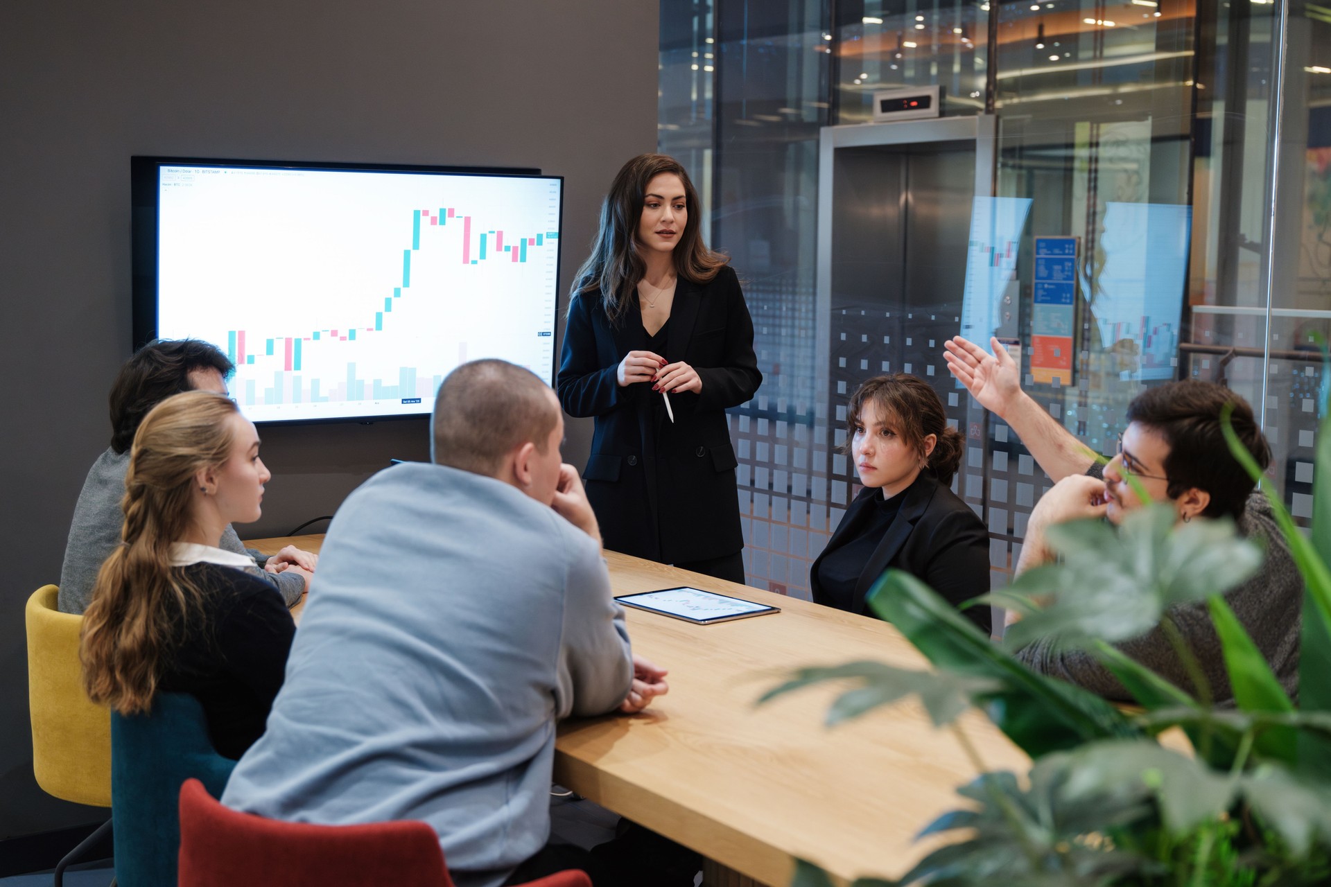 Young business people having stock trading and investing course